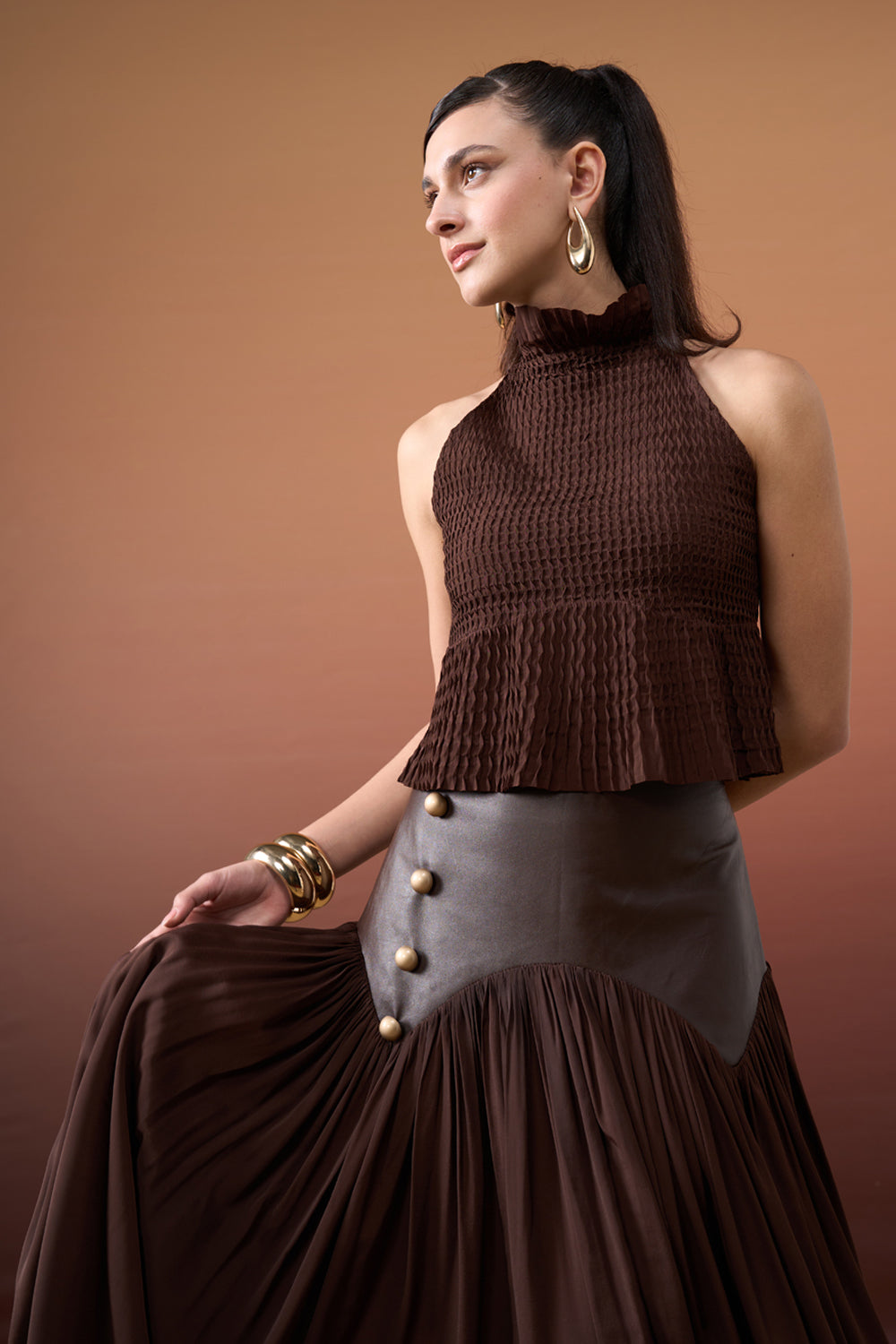 Divya Bopanna In Our Brown Pleated Top & Skirt Set